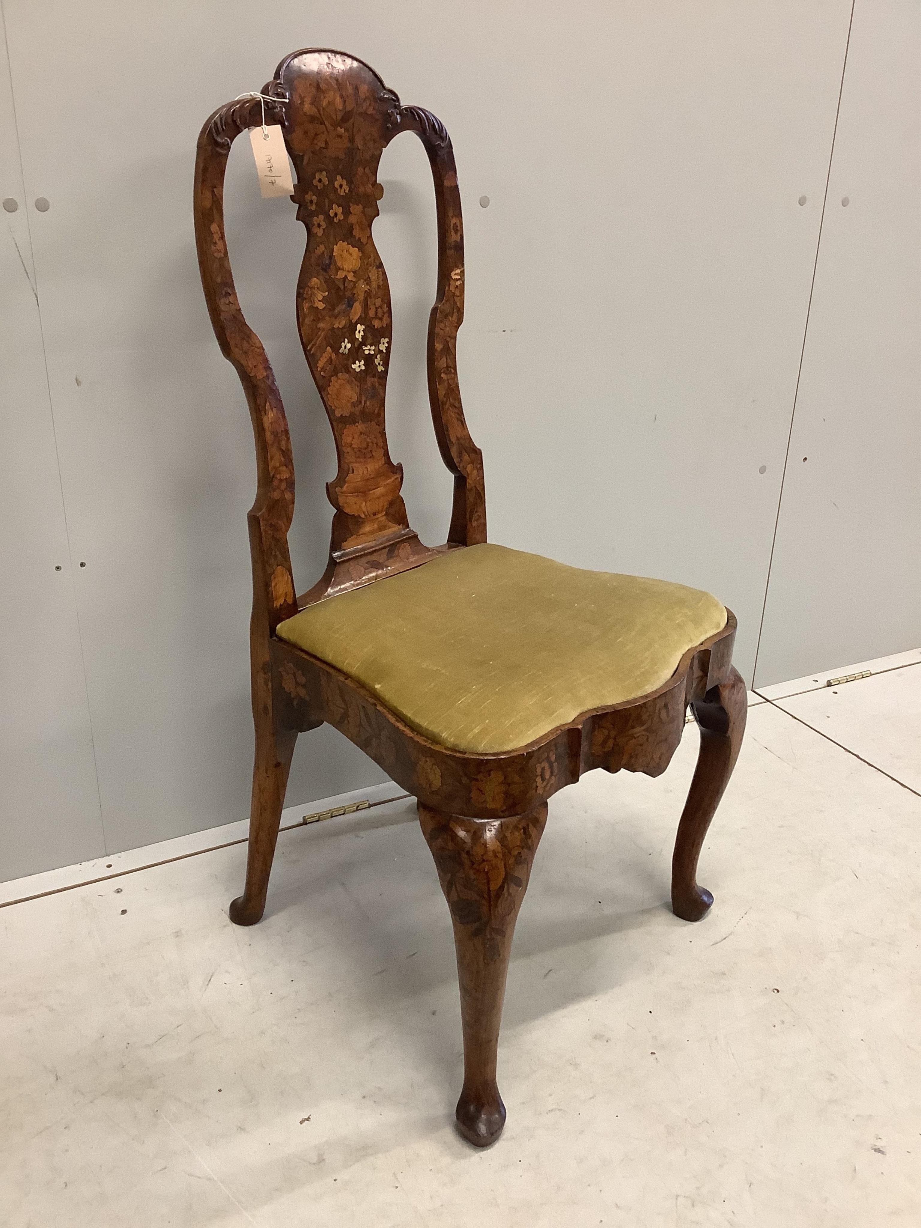 An 18th century Dutch marquetry inlaid dining chair, width 51cm, depth 41cm, height 106cm. Condition - good